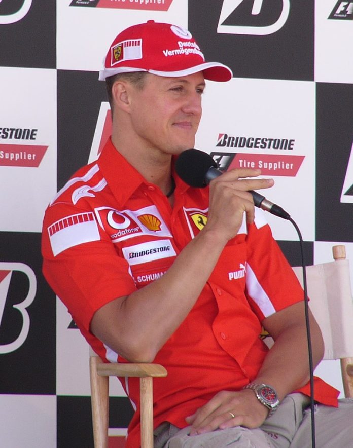 Michael_Schumacher_2005_United_States_GP_(19872855)_(cropped)